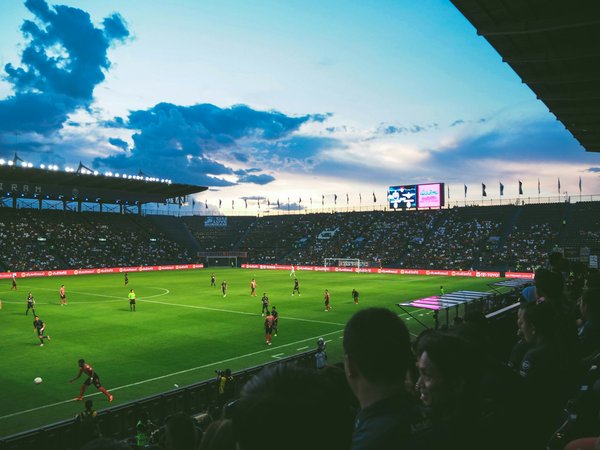 How can football clubs utilize social media to attract new sponsors?